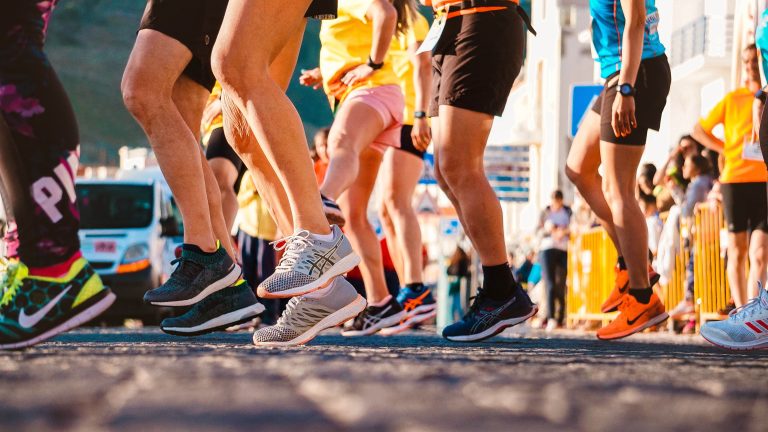 people warming up for marathon
