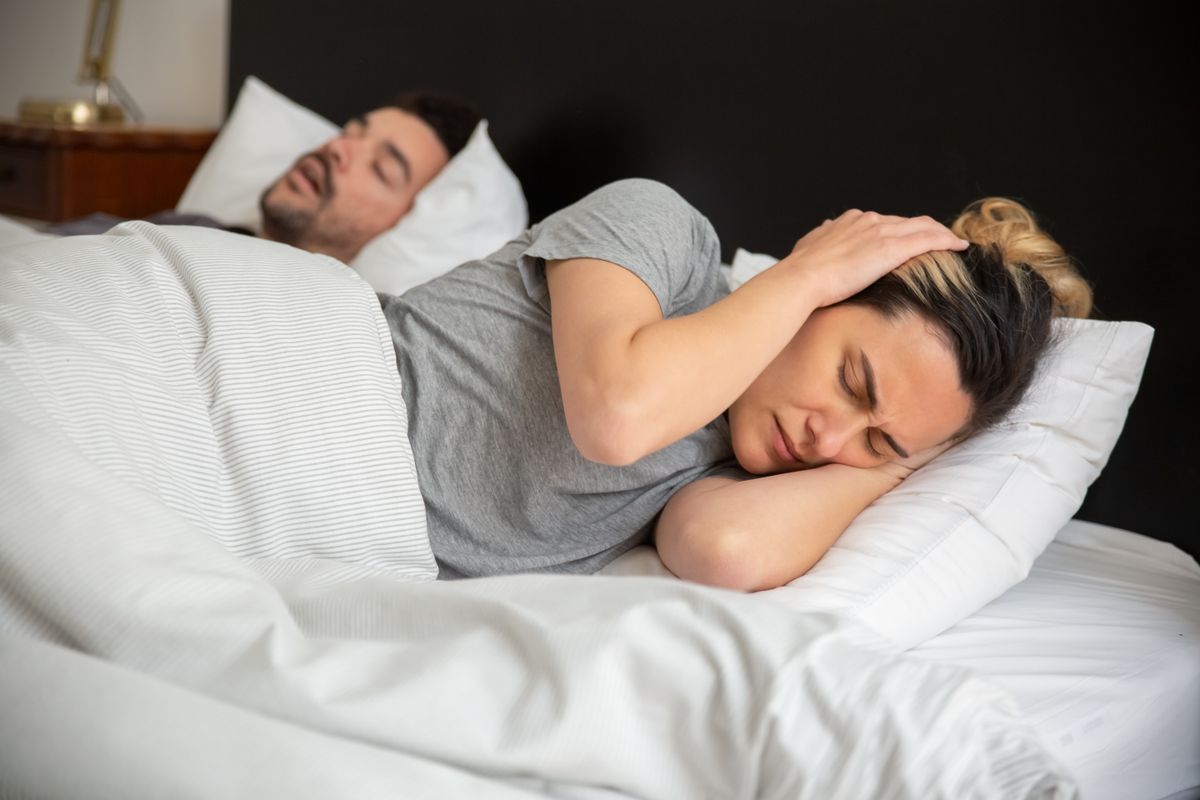 Mouth tape vs mouthpiece for snoring: woman kept awake by her partner's snoring